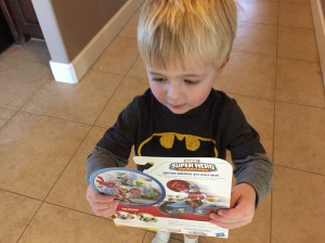 Ian with some bribery toys after a successful potty trip.